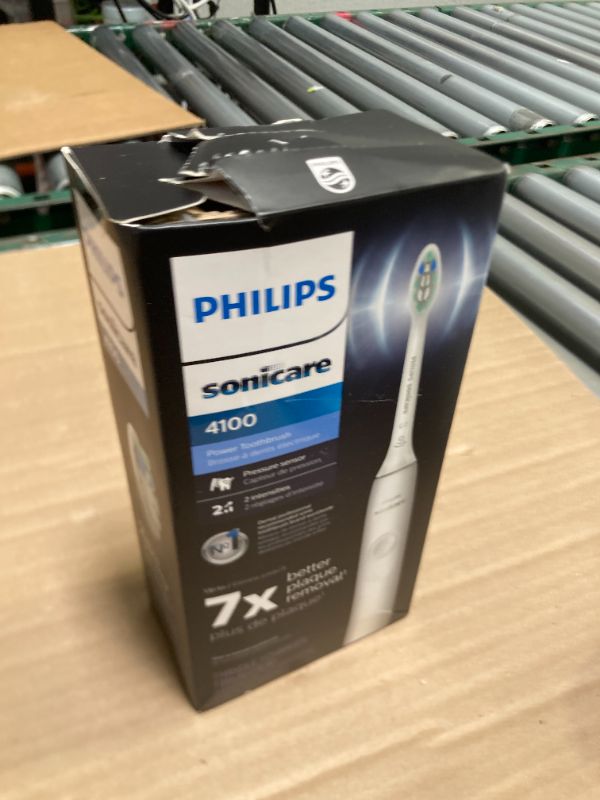 Photo 1 of Philips Sonicare 4100 Rechargeable Electric Toothbrush, with Pressure Sensor, 2 Intensity Settings, SmarTimer and QuadPacer, 14-Day Battery Life, White, Model HX3681/23