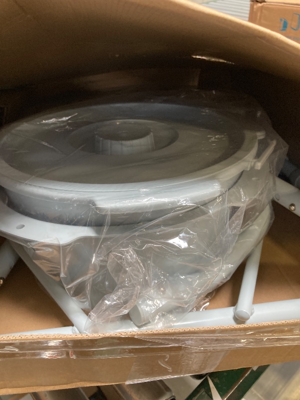 Photo 1 of Drive Medical 11148-1 Folding Steel Bedside Commode Chair, Portable Toilet, Supports Individuals Weighing Up To 350 Lbs, with 7.5 Qt. Bucket and 13.5 Inch Seat, Grey