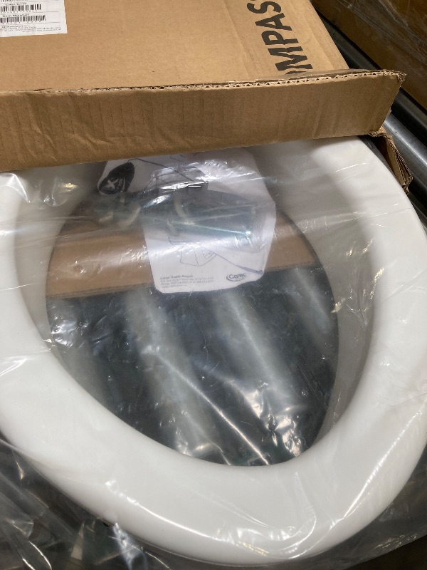 Photo 1 of Carex Toilet Seat Riser, Elongated Raised Toilet Seat Adds 3.5 inches to Toilet Height, for Assistance Bending or Sitting, 300 Pound Weight Capacity Toilet Riser