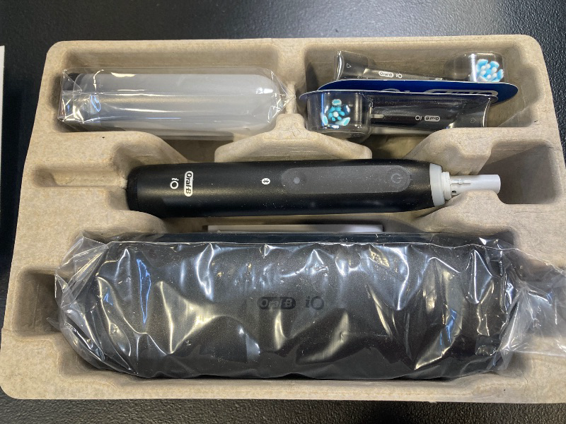 Photo 1 of Oral-B iO Deep Clean + Whiten Rechargeable Electric Toothbrush with Visible Pressure Sensor, 2 Minute Timer, 5 Cleaning Settings, 1 iO5 Limited, 3 Toothbrush Heads, Travel Case & Refill Holder, Black