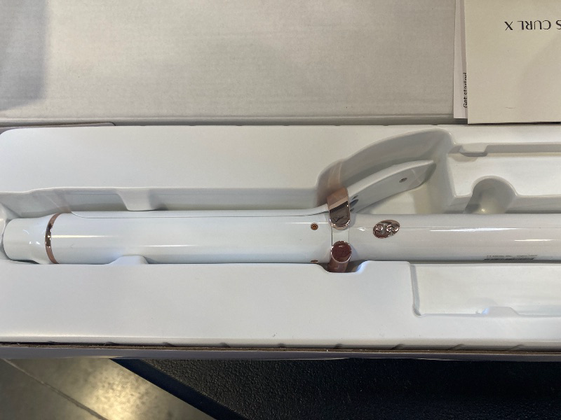 Photo 1 of T3 SinglePass Curl X Extra-Long Barrel Curling Iron with 9 Heat Settings and Ceramic Barrel for Fast Styling and Lasting Results on All Hair Types