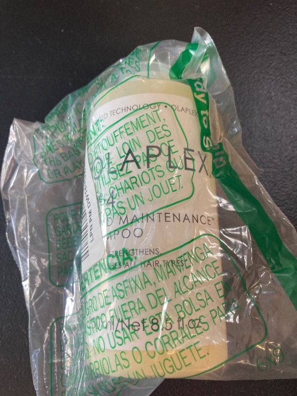 Photo 1 of Olaplex No. 4 Bond Maintenance Shampoo, Repairs, Strengthens, & Nourishes All Hair Types, Adds Shine & Leaves Hair Feeling Soft, 8.5 fl oz