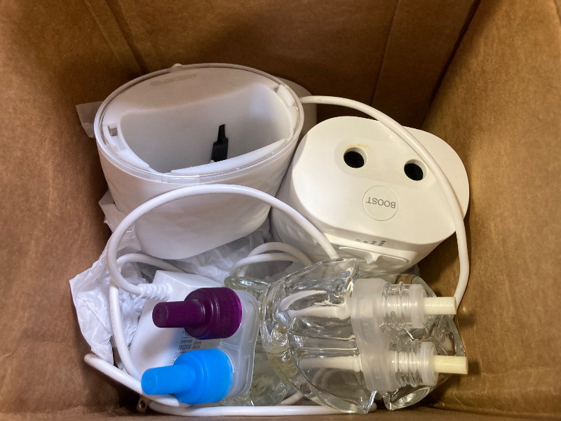 Photo 1 of Febreze Plug Scent Booster Continuous Scent Device Oil Diffuser, Compatible with Febreze Air Freshener Plug in Refills