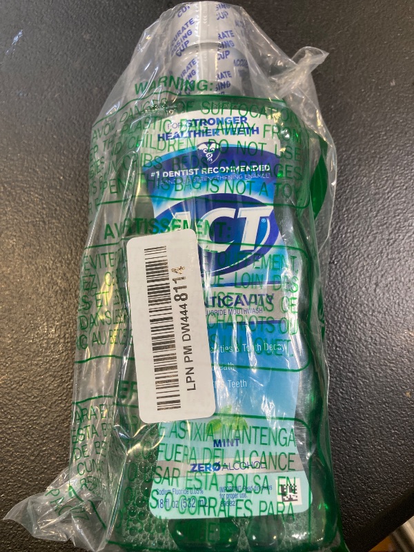 Photo 1 of Act Anticavity Fluoride Mouthwash Mint 18 fl oz (Pack of 3)(Packaging May Vary)