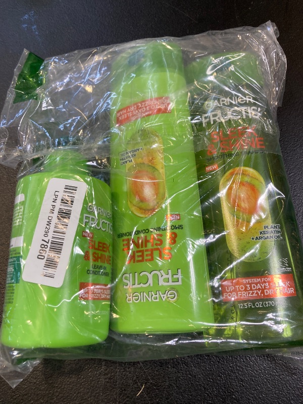 Photo 1 of Garnier Fructis Sleek & Shine Shampoo, Conditioner + Leave-In Conditioner Set for Frizzy, Dry Hair, Plant Keratin + Argan Oil (3 Items), 1 Kit (Packaging May Vary)