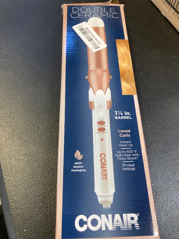 Photo 1 of Conair Double Ceramic 1 1/4-Inch Curling Iron, 1 ¼ inch barrel produces loose curls – for use on medium and long hair