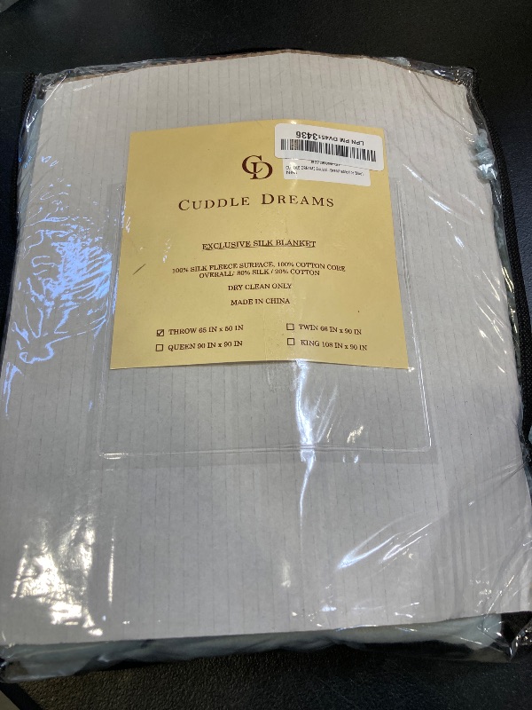 Photo 1 of CUDDLE DREAMS Silk Throw Blanket with Hand-Knotted Fringe, Natural, Soft & Breathable (Ice Blue)
