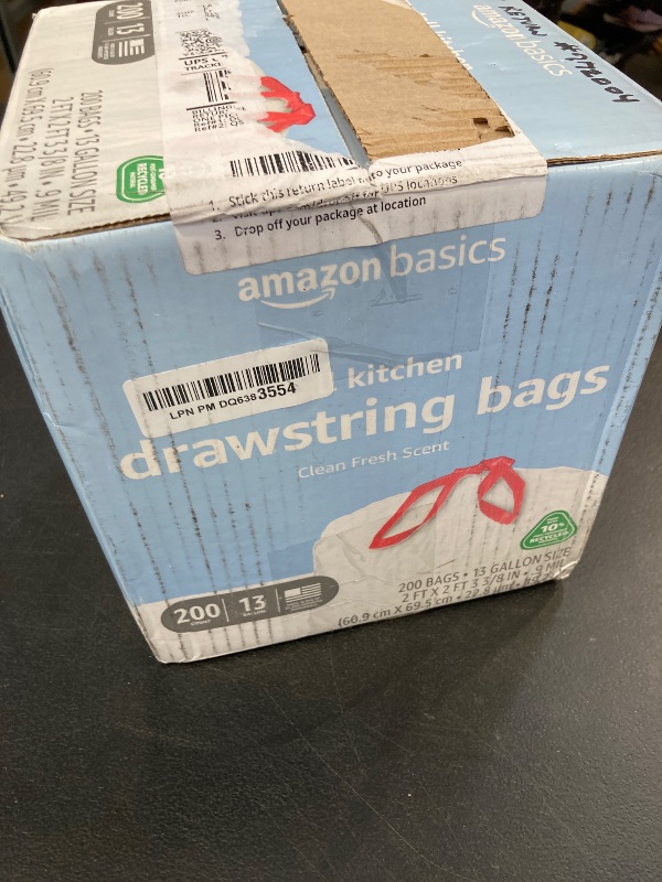 Photo 1 of Amazon Basics 13 Gallon Tall Kitchen Drawstring Trash Bags, Clean Fresh Scnet, 10% Post Consumer Recycled, 200 Count