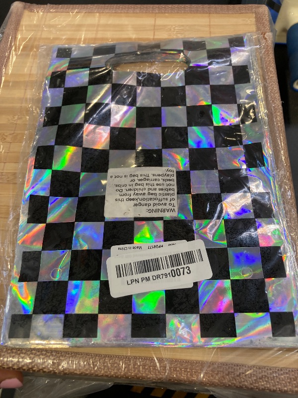 Photo 1 of FunnyPars 50 Pcs Iridescent Checkered Race Car Party Favor Bags, Plastic Black and Iridescent Car Goodie Treat Bags, Racecar Laser Plaid Gift Bags for Kids Fast Race Car Birthday Party Decorations