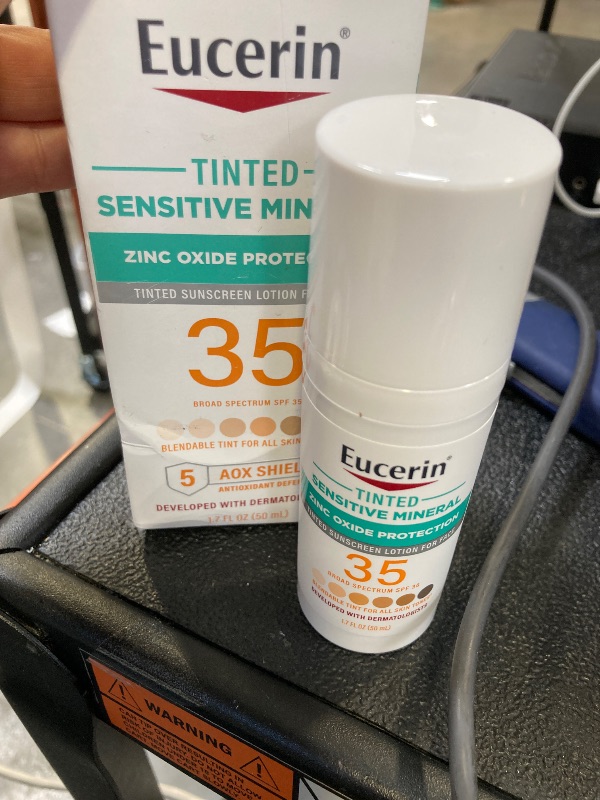 Photo 1 of Eucerin Sun Tinted Sensitive Mineral Face Sunscreen Lotion SPF 35, Non-Comedogenic Mineral Sunscreen with Gentle Zinc Oxide Protection for Sensitive Skin, 1.7 Fl Oz Bottle