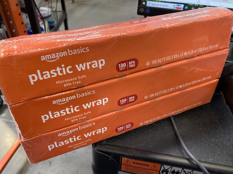 Photo 1 of Amazon Basics Plastic Wrap, 300 Sq Ft, Pack of 3, 100 Sq Ft Rolls