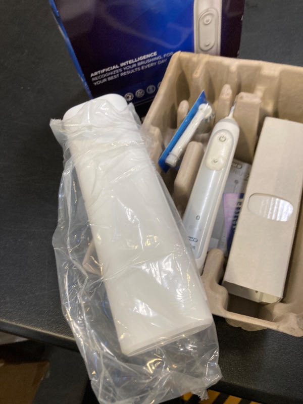 Photo 1 of Oral-B Genius X Limited Rechargeable Electric Toothbrush with 1 Replacement Brush Head, Travel Case, White