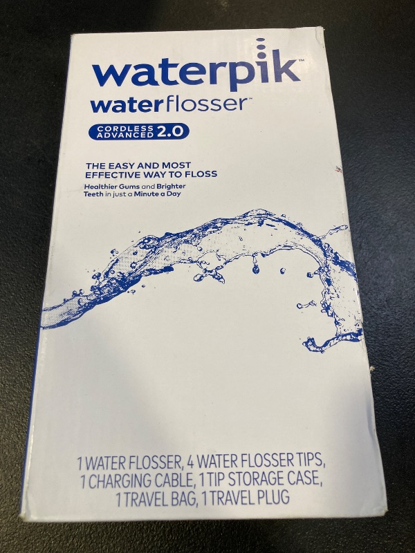 Photo 1 of Waterpik Cordless Advanced 2.0 Water Flosser For Teeth, Gums, Braces, Dental Care With Travel Bag and 4 Tips, ADA Accepted, Rechargeable, Portable, and Waterproof, White WP-580, Packaging May Vary