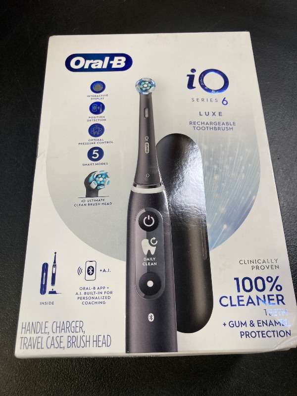 Photo 1 of Oral-B iO Series 10 Rechargeable Electric Toothbrush with Visible Pressure Sensor to Protect Gums, 2 Min Timer, 7 Cleaning Settings, 4 Replacement Toothbrush Heads, and Charging Travel Case, Black