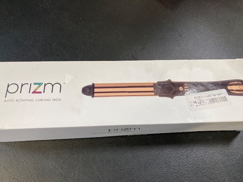 Photo 1 of Prizm Nano Titanium Automatic Rotating Curling Iron 1.25 Inch Worldwide Dual Voltage Curling Wand Hair Wand LCD Display 11 Temperature Effortless Curls Spinning Barrel Negative Ions 360° Swivel Cord
