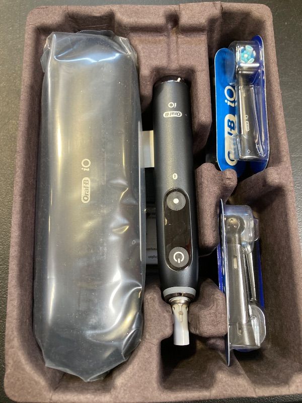 Photo 1 of Oral-B iO Series 9 Electric Toothbrush with 3 Replacement Brush Heads, Black Onyx