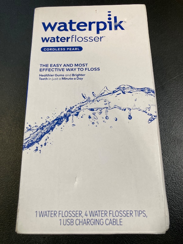 Photo 1 of Waterpik Cordless Pearl Rechargeable Portable Water Flosser for Teeth, Gums, Braces Care and Travel with 4 Flossing Tips - ADA Accepted, WF-13 Black, Packaging May Vary