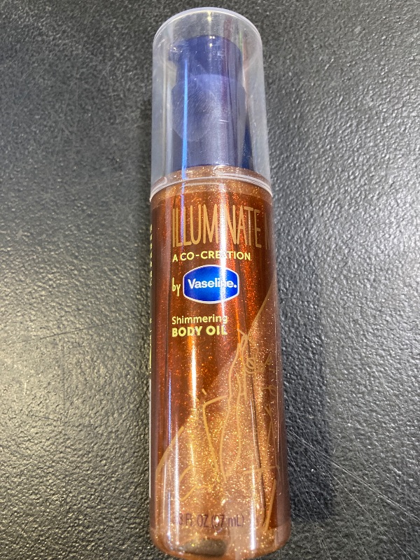 Photo 1 of Vaseline Illuminate Me Shimmering Body Oil Created for Melanin Rich Skin, Illuminates Skin with Finishing Touch of Shimmer for Glowing Skin 3.3 oz
