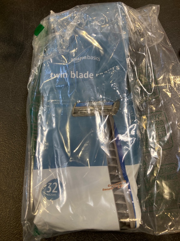Photo 1 of Amazon Basics Twin Blade Pivoting Disposable Razors with Rubber Grip, 32 Count, 1-Pack (Previously Solimo)