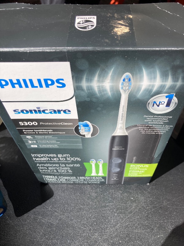 Photo 1 of Philips Sonicare ProtectiveClean 5300 Rechargeable Electric Toothbrush, with Pressure Sensor, 3 Cleaning Modes, SmarTimer and QuadPacer, with 2 Bonus Brush Heads, Travel Case, Black, Model HX6423/34