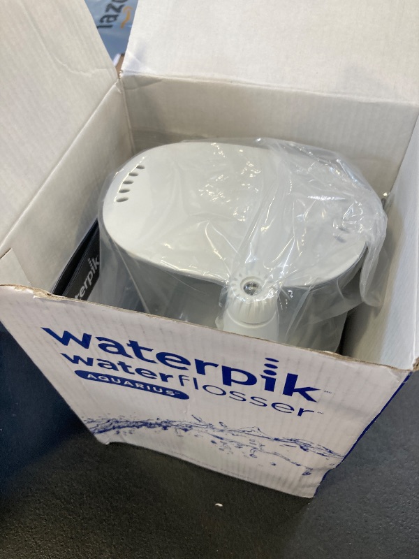 Photo 1 of Waterpik Aquarius Water Flosser For Teeth Cleaning, Gums, Braces, Dental Care, Electric Power With 10 Settings, 7 Tips For Multiple Users And Needs, ADA Accepted, White WP-660, Packaging May Vary