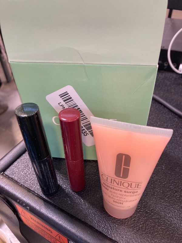 Photo 1 of Clinique Icons Set | Almost Lipstick in Black Honey, Mini Travel Size | Moisture Surge 100H Moisturizer, Mini Travel Size, 1 Fl Oz| High Impact Mascara, Mini Travel Size | Hydrating + Glow