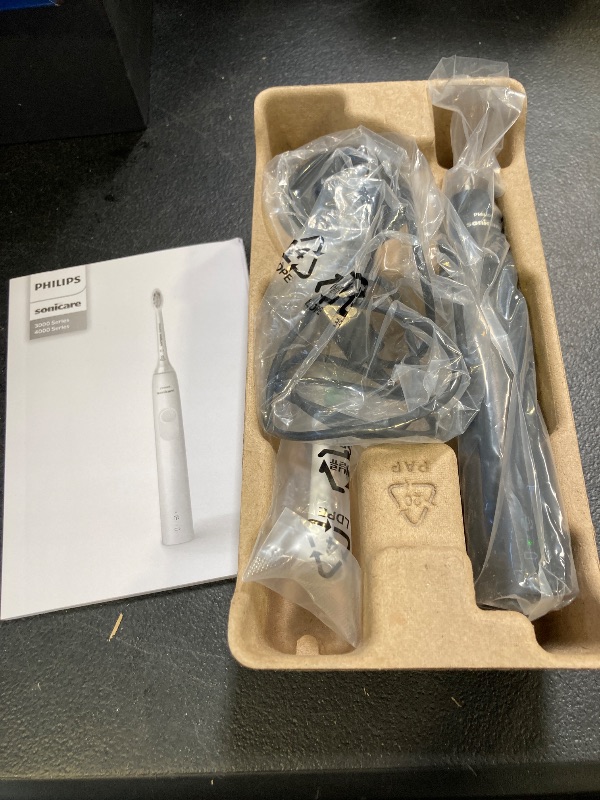 Photo 1 of Philips Sonicare 4100 Rechargeable Electric Toothbrush, with Pressure Sensor, 2 Intensity Settings, SmarTimer and QuadPacer, 14-Day Battery Life, Black, Model HX3681/24