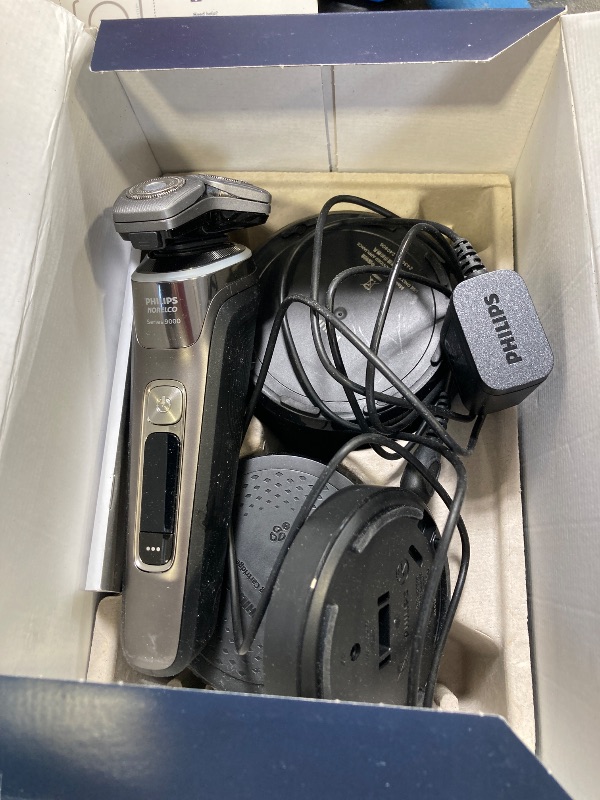 Photo 1 of Philips Norelco Shaver Series 9000, Wet and Dry Electric Shaver, with Lift & Cut Shaving System and SenseIQ Technology, Pop-up Trimmer, Cleaning Pod, Charging Stand and Travel Case, Model S9987/85