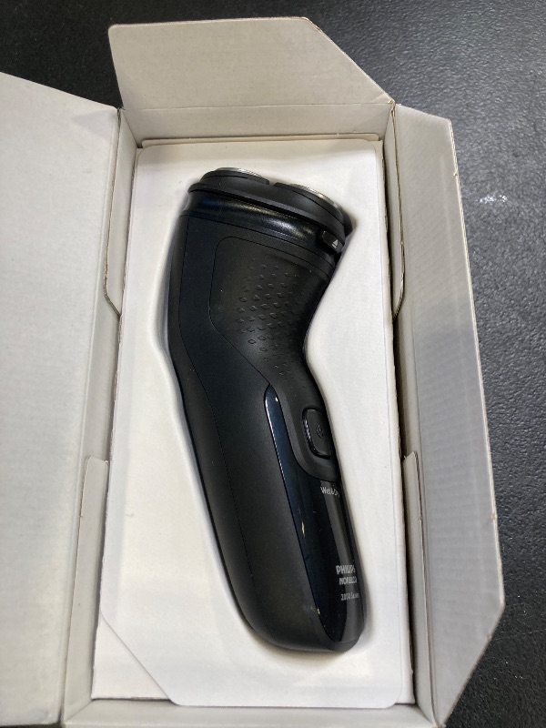 Photo 1 of Philips Norelco Shaver 2400 Series, Wet and Dry Electric Shaver, Pop-up Trimmer, P-Cap, Deep Black, Model X3001/90