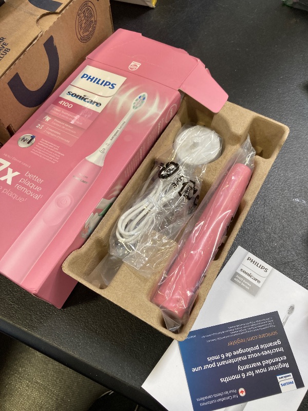Photo 1 of Philips Sonicare 4100 Rechargeable Electric Toothbrush, with Pressure Sensor, 2 Intensity Settings, SmarTimer and QuadPacer, 14-Day Battery Life, Deep Pink, Model HX3681/26
