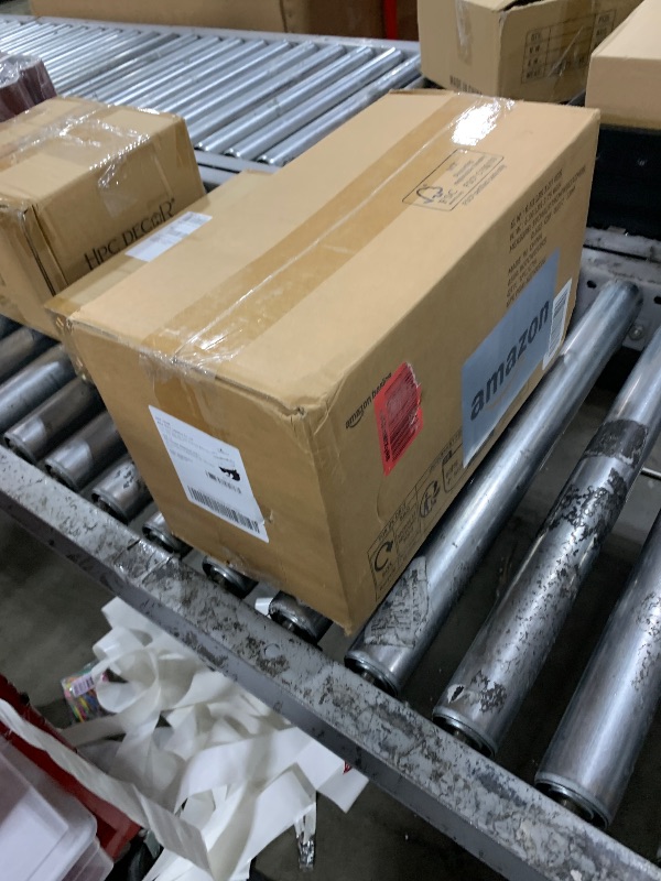 Photo 1 of Amazon Basics Leakproof, Absorbent, Disposable Puppy Pads for Potty Training, Heavy Duty Absorbency, Regular Size, 24 x 23 Inches, Pack of 50, Blue & White