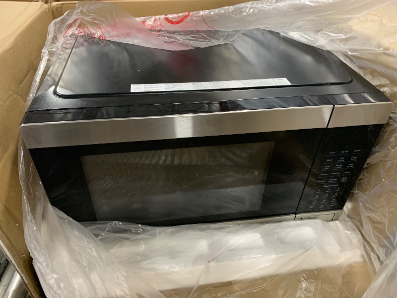 Photo 1 of GE GCST10A1WSS 4-in-1 Microwave Oven, 1,050 Watts Air Fryer, Broiler & Convection Mode, Child-Lock Technology, Kitchen Essentials for The Countertop or Dorm Room, 1.0 Cu. Ft, Stainless Steel