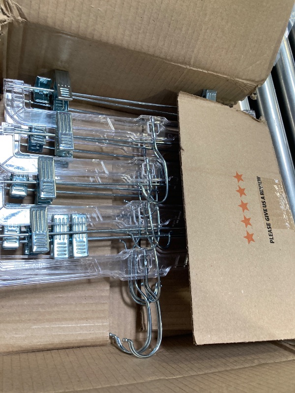 Photo 1 of 12PCS OF ADJUSTABLE HANGERS 