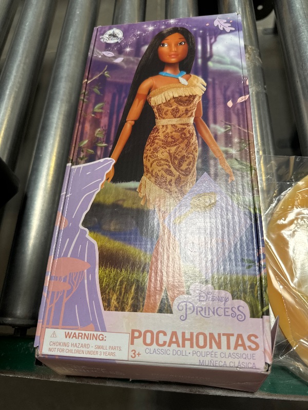 Photo 1 of Disney Store Official Disney Princess Classic Doll (Pocahontas), 11 Inches, Includes Brush with Molded Details, Fully Posable Toy in Classic Outfit - Disney Princess Toys for Girls
