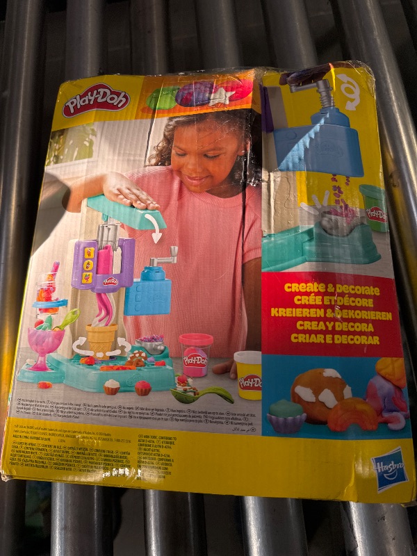 Photo 1 of Play-Doh Rainbow Swirl Ice Cream Playset with 7 Pretend Play Kitchen Accessories, Arts and Crafts Toys for 3 Year Old Girls and Boys and Up