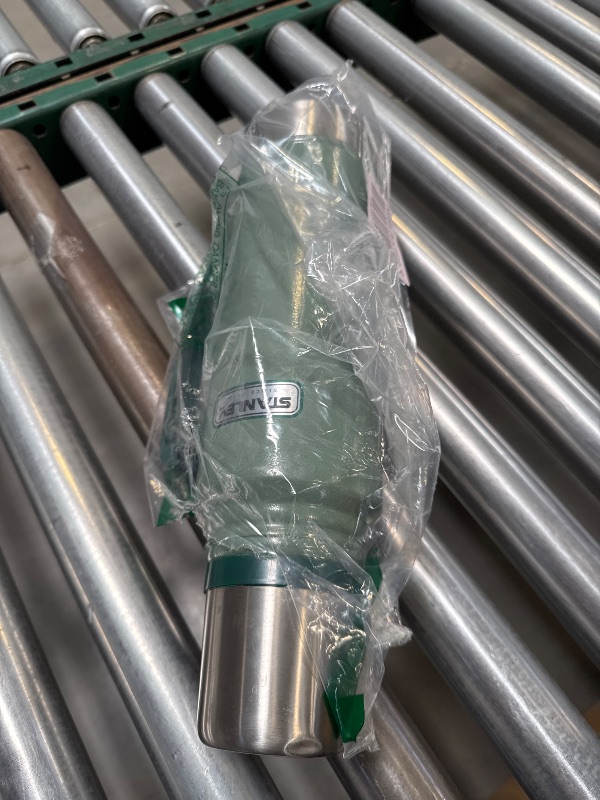 Photo 1 of Stanley Heritage Classic Vacuum Bottle with Handle 1.1 qt | Wide Mouth with Leakproof Cup Lid | Keep Drinks Hot or Cold for Travel | Insulated Stainless Steel Thermos | BPA-Free | Hammertone Green