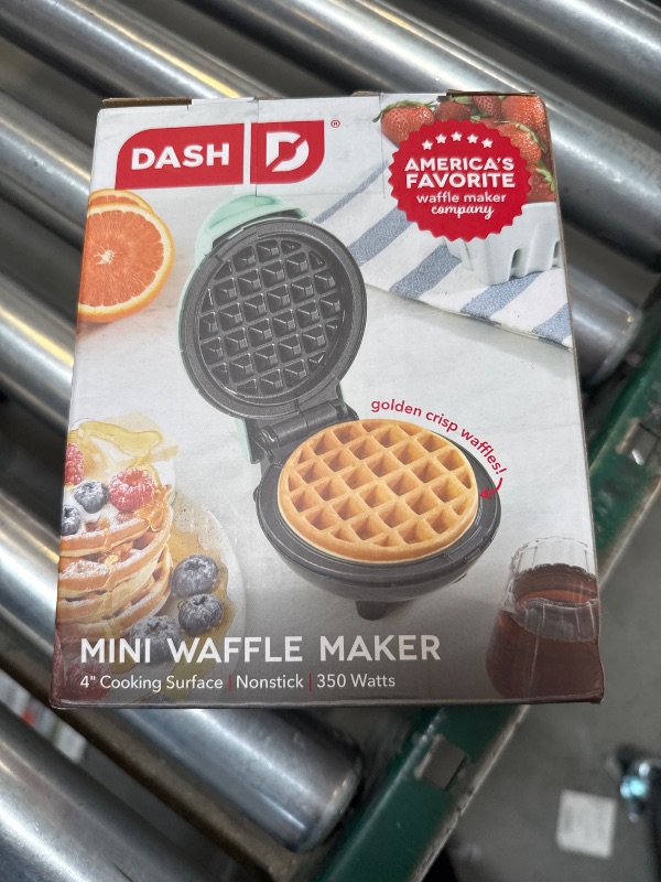 Photo 1 of DASH Mini Waffle Maker - 4” Waffle Mold, Nonstick Waffle Iron with Quick Heat-Up, PTFE Nonstick Surface - Perfect Mini Waffle Maker for Kids and Families, Just Add Batter (Aqua)