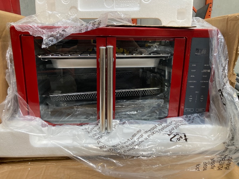 Photo 1 of Oster Air Fryer Oven, 10-in-1 Countertop Toaster Oven Stainless Steel French Doors
