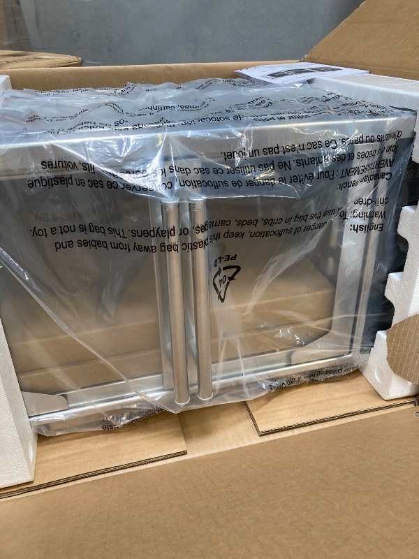 Photo 1 of Oster Air Fryer Oven 10-in-1 Countertop Toaster Large Enough for 2 Pizzas Stainless Steel French Doors XL Sized
