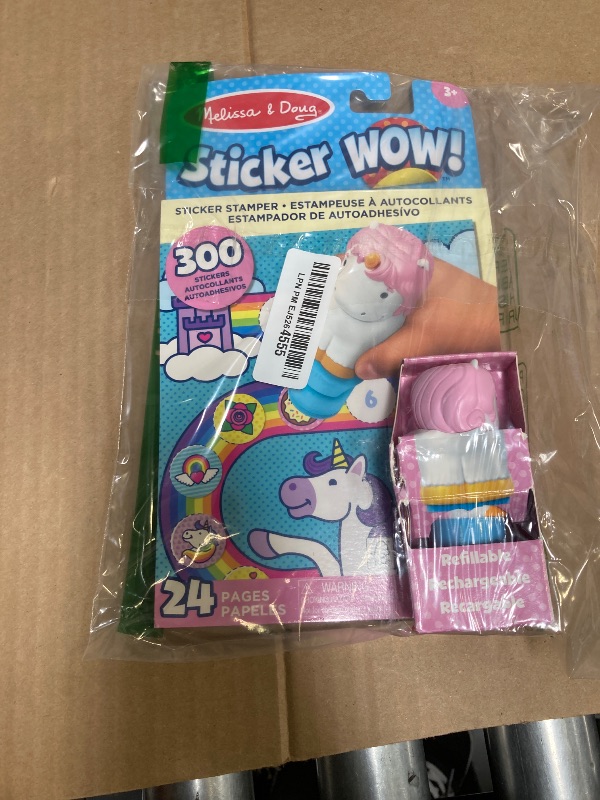 Photo 1 of Melissa & Doug Sticker WOW!™ 24-Page Activity Pad and Sticker Stamper, 300 Stickers, Arts and Crafts Fidget Toy Collectible Character – Unicorn - FSC Certified