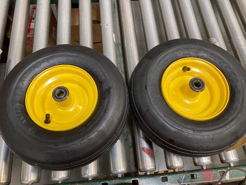 Photo 1 of 13x5.00-6 tubeless tire with yellow rim