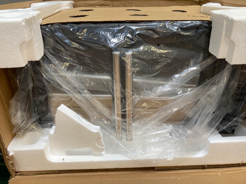 Photo 1 of Oster Air Fryer Oven, 10-in-1 Countertop Toaster Oven Stainless Steel French Doors

