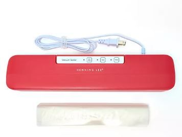 Photo 1 of Henning Lee Compact Vacuum Sealer with (10) Bags