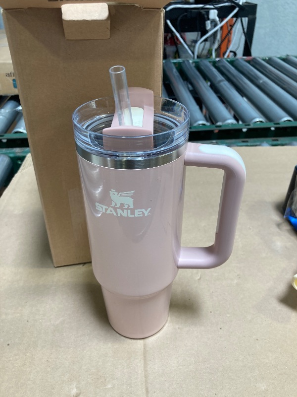 Photo 1 of STANLEY Quencher H2.0 Tumbler with Handle and Straw 30 oz | Flowstate 3-Position Lid | Cup Holder Compatible for Travel | Insulated Stainless Steel Cup | BPA-Free | Peach Whip Gloss