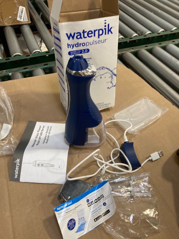 Photo 1 of Waterpik Cordless Advanced 2.0 Water Flosser For Teeth, Gums, Braces, Dental Care With Travel Bag and 4 Tips, ADA Accepted, Rechargeable, Portable, and Waterproof, White WP-580, Packaging May Vary