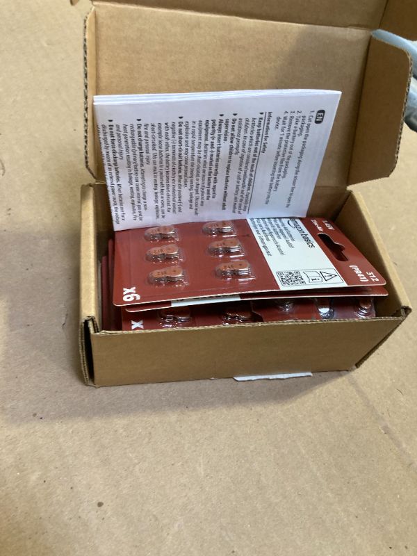 Photo 1 of Amazon Basics 60-Pack Hearing Aid Size 312 Zinc-Air Batteries, 1.45 Volt, Brown Tab, 4-Year Shelf Life, Child-Safe Package (Use Scissors to Open)