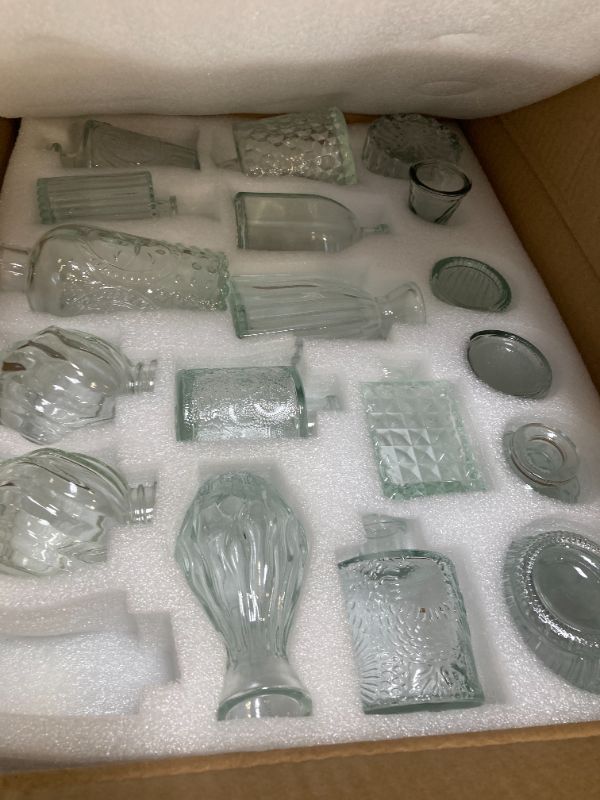 Photo 1 of Brajttt Set of 32 Bud Vases for Flowers, Small Vintage Glass Bottles for Rustic Wedding Centerpieces and Home Decor