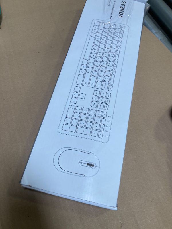 Photo 1 of Wireless Keyboard and Mouse Combo - Full Size Slim Thin Wireless Keyboard Mouse with Numeric Keypad 2.4G Stable Connection Adjustable DPI (White & Silver)