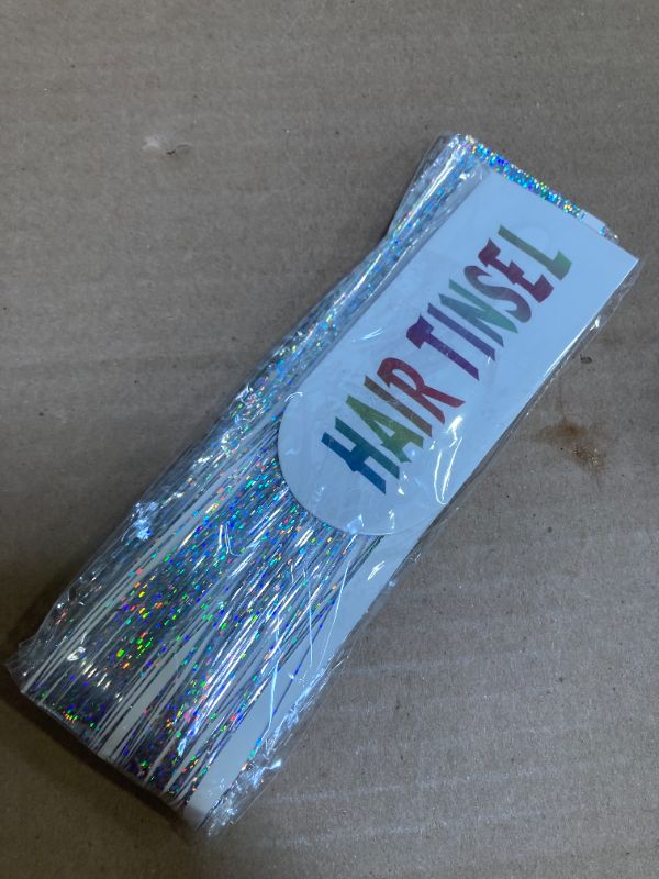 Photo 1 of AIAIZHQH 23.6Inch Clip in Hair Tinsel Kit, Silver Hair Tinsel Heat Resistant Fairy Hair Tinsel Clip in Glitter Hair Extensions, Sparkles Festival Hair Accessories for Women Girls (Silver)