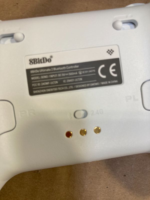 Photo 1 of 8Bitdo Ultimate 2 Bluetooth Controller with TMR Joysticks, Switchable Hall Effect/Tactile Triggers, Vibration, Motion Control, RGB Fire Ring and Back Buttons for Switch/Switch 2 & Windows PC - White